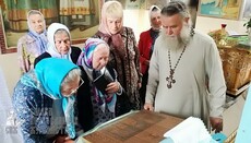Icon appears on a wooden surface in the house of believers near Rovno