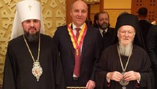 Patriarch Bartholomew awards Uniate Parubiy with St. Andrew cross