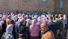UOC believers pray at a closed temple in homeland of ex-metropolitan Simeon