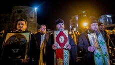 UOC representatives take part in a protest cross procession in Montenegro
