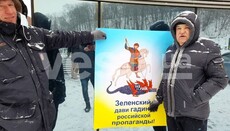Posters with Zelensky depicted as George the Victorious hung in Kyiv
