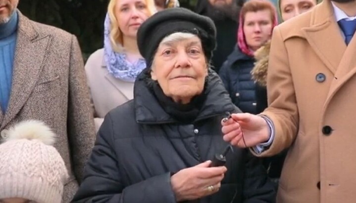 A Lavra parishioner recalls how temples and buildings were rebuilt. Photo: a screenshot of KDAiS YouTube channel video