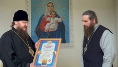 Cherkasy bishop awards rector of raided church 