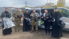 UOC priests help medics evacuate wounded from front line