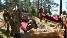 В Горловской епархии УПЦ в День Победы торжественно перезахоронили павших воинов