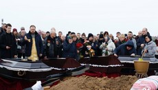 UOC priest holds funeral service for family killed in airstrike in Kharkiv