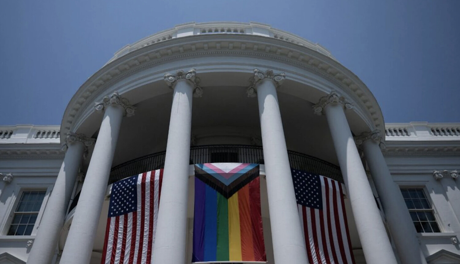 The White House with the US and LGBT flags. Photo: dailywire.com