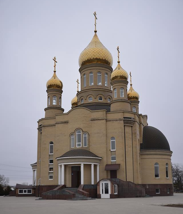 Oameni şi biserici de pe linia frontului: oraşul Mariupol фото 6